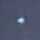 A zoomed-in image of Earth as it appears in the reprocessed photo.
